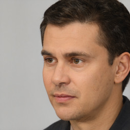 Neutral white adult male with short  brown hair and brown eyes