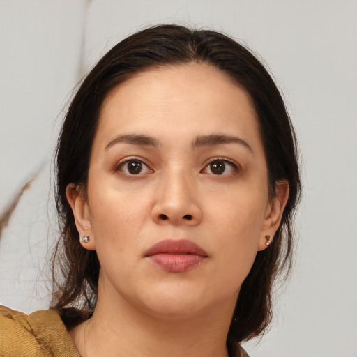 Neutral asian young-adult female with medium  brown hair and brown eyes