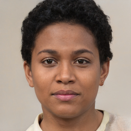 Neutral black young-adult female with short  brown hair and brown eyes