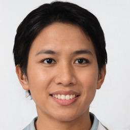 Joyful asian young-adult female with short  brown hair and brown eyes