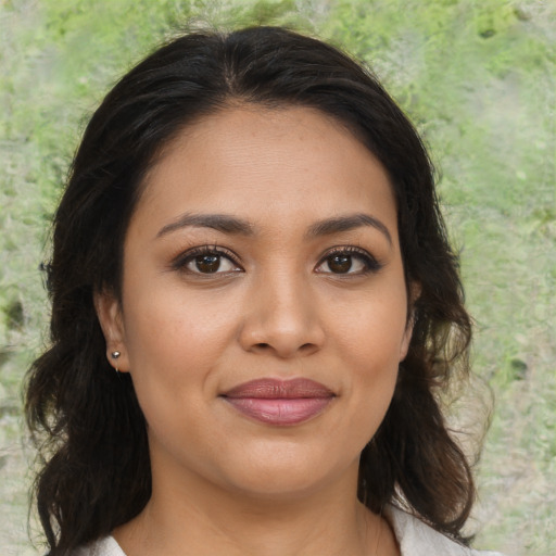 Joyful asian young-adult female with medium  brown hair and brown eyes