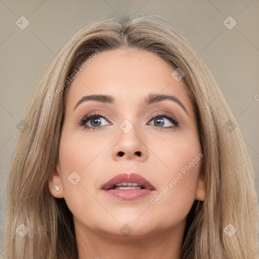 Neutral white young-adult female with long  brown hair and brown eyes