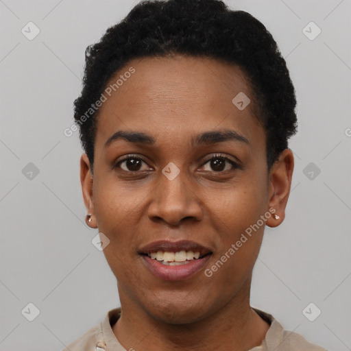 Joyful black young-adult female with short  black hair and brown eyes