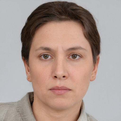 Neutral white young-adult female with short  brown hair and brown eyes