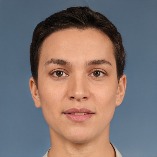 Joyful white young-adult female with short  brown hair and brown eyes