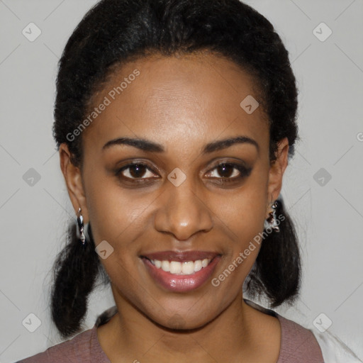 Joyful black young-adult female with medium  black hair and brown eyes