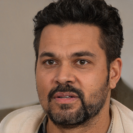 Neutral white adult male with short  black hair and brown eyes