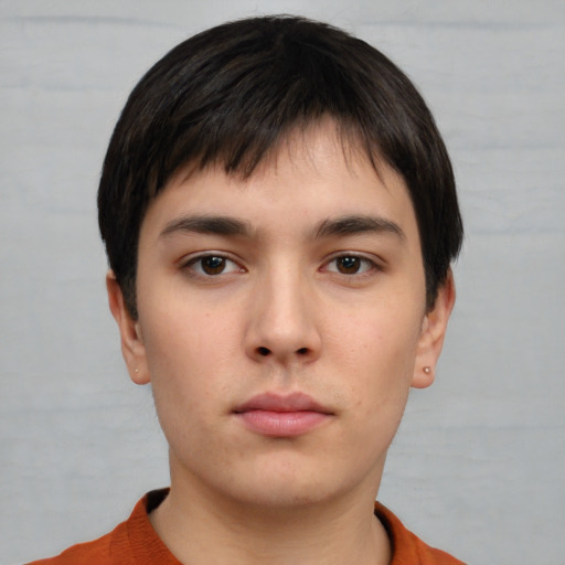 Neutral white young-adult male with short  brown hair and brown eyes