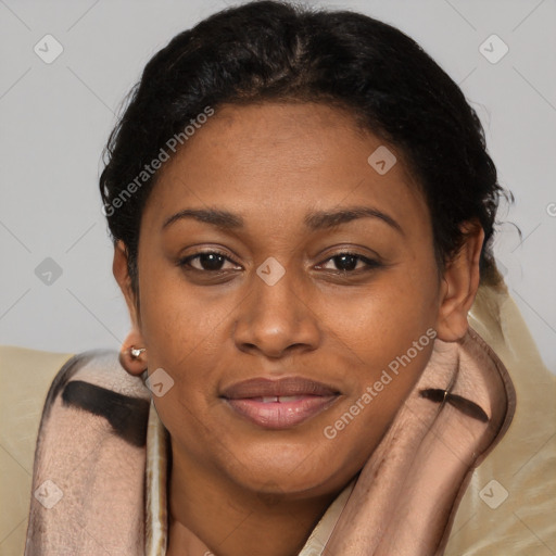 Joyful black young-adult female with short  brown hair and brown eyes