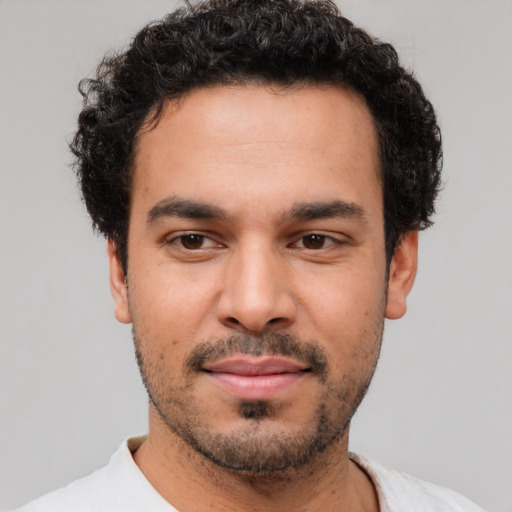 Neutral white young-adult male with short  black hair and brown eyes