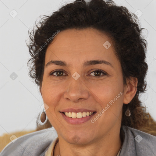 Joyful white adult female with short  brown hair and brown eyes