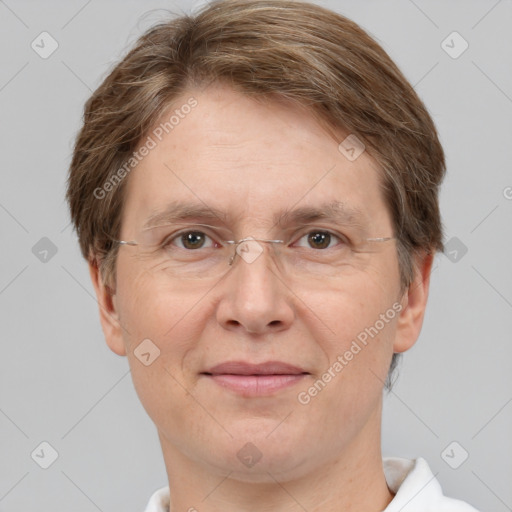 Joyful white adult male with short  brown hair and grey eyes