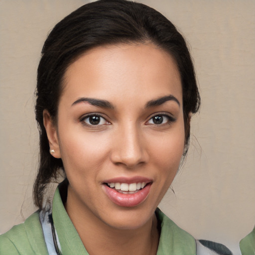 Joyful white young-adult female with medium  brown hair and brown eyes