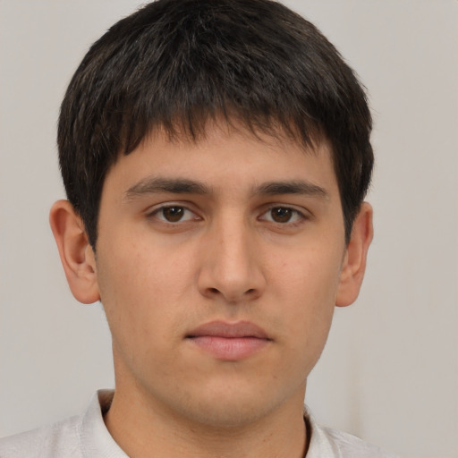 Neutral asian young-adult male with short  brown hair and brown eyes