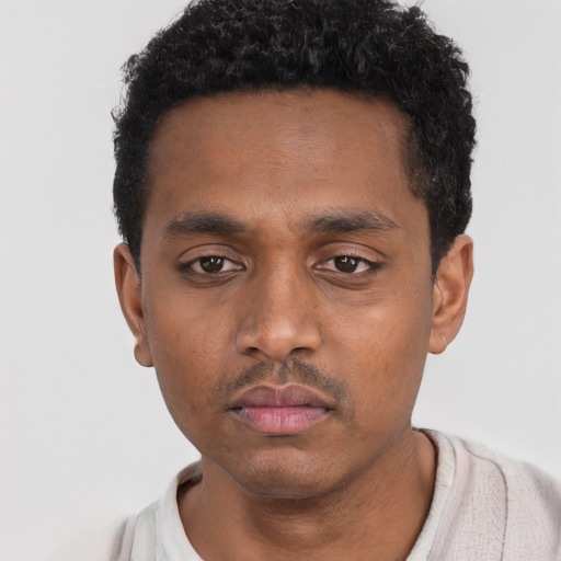 Neutral black young-adult male with short  black hair and brown eyes
