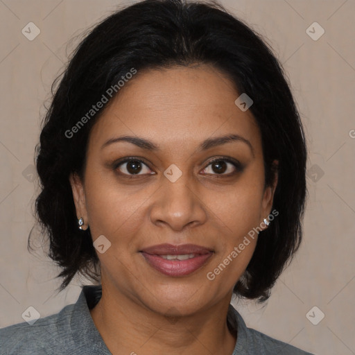 Joyful black adult female with medium  brown hair and brown eyes