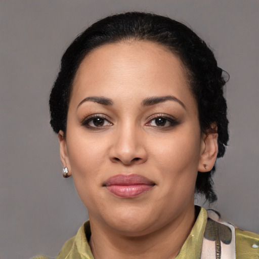Joyful latino young-adult female with short  brown hair and brown eyes