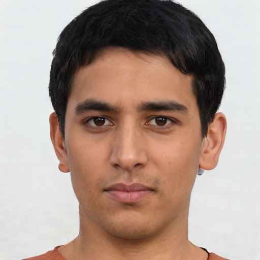 Neutral asian young-adult male with short  black hair and brown eyes