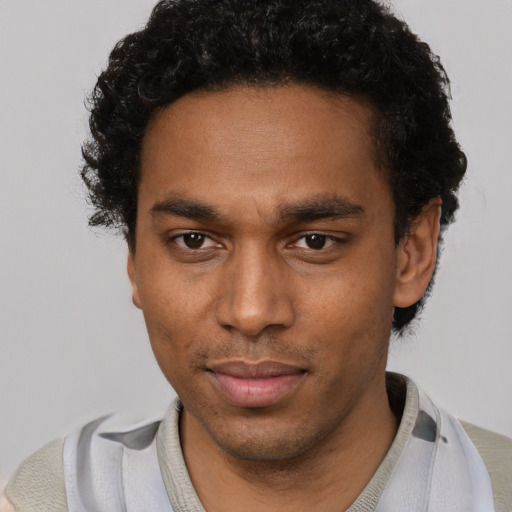 Neutral black young-adult male with short  black hair and brown eyes