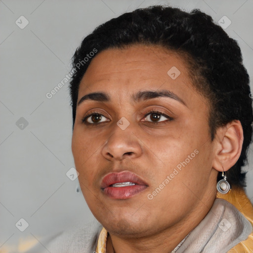 Joyful latino young-adult female with short  brown hair and brown eyes