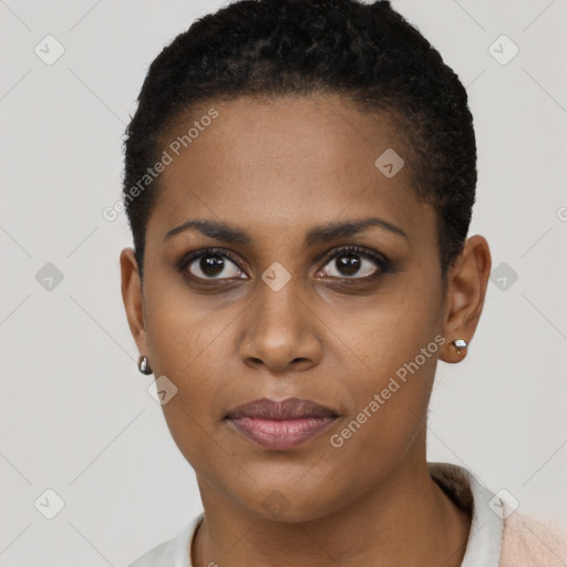 Joyful black young-adult female with short  brown hair and brown eyes