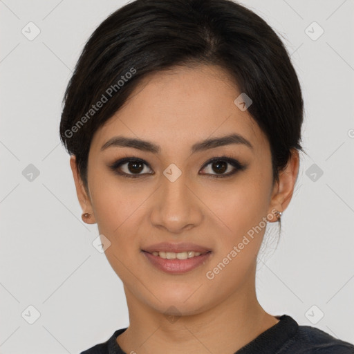 Joyful asian young-adult female with short  black hair and brown eyes