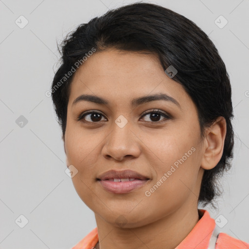 Joyful asian young-adult female with medium  black hair and brown eyes