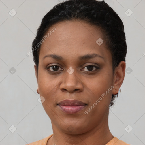 Joyful latino young-adult female with short  black hair and brown eyes