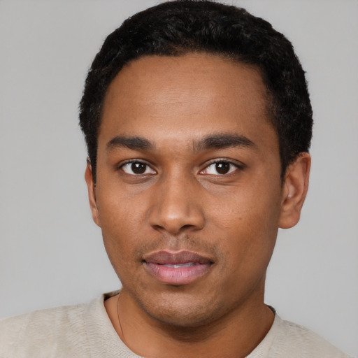 Neutral black young-adult male with short  black hair and brown eyes