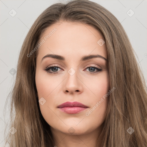 Neutral white young-adult female with long  brown hair and brown eyes