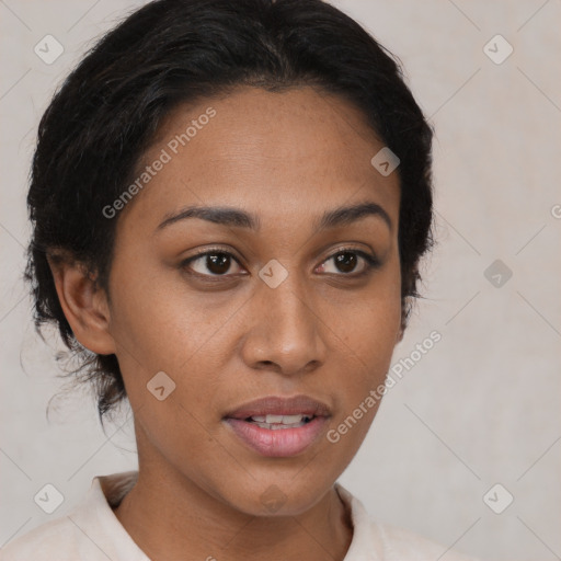 Joyful latino young-adult female with short  brown hair and brown eyes