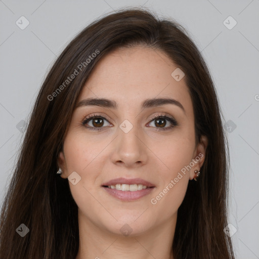 Joyful white young-adult female with long  brown hair and brown eyes