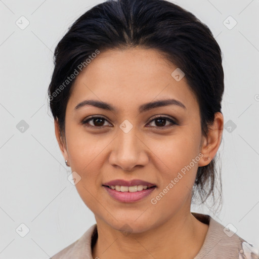 Joyful latino young-adult female with medium  black hair and brown eyes