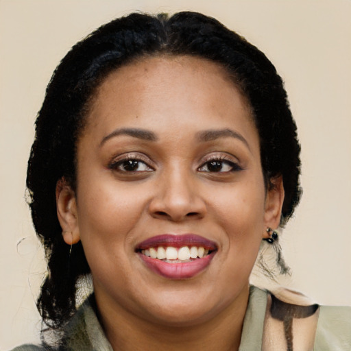 Joyful latino young-adult female with medium  black hair and brown eyes