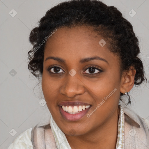 Joyful black young-adult female with long  brown hair and brown eyes