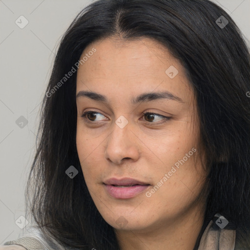 Joyful asian young-adult female with long  brown hair and brown eyes