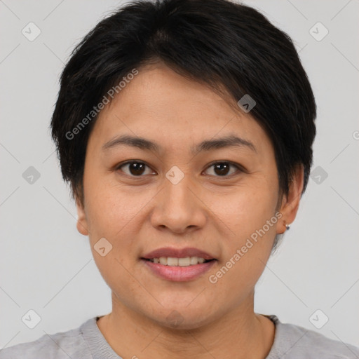 Joyful asian young-adult female with short  brown hair and brown eyes