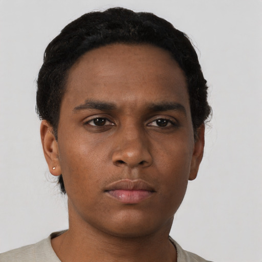 Neutral black young-adult male with short  black hair and brown eyes