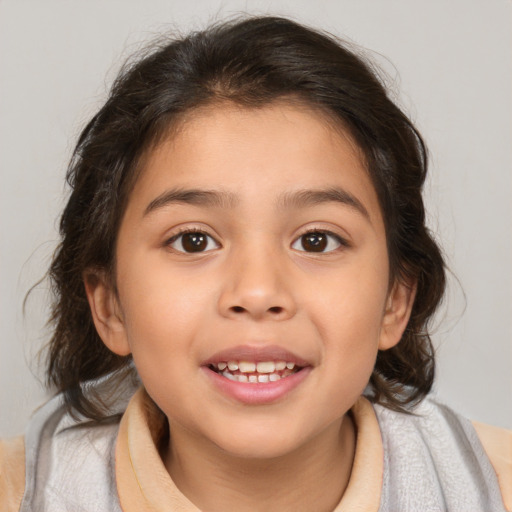 Joyful white child female with medium  brown hair and brown eyes