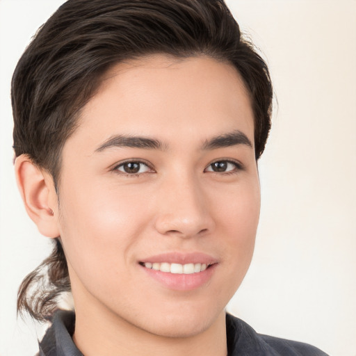 Joyful white young-adult male with medium  brown hair and brown eyes