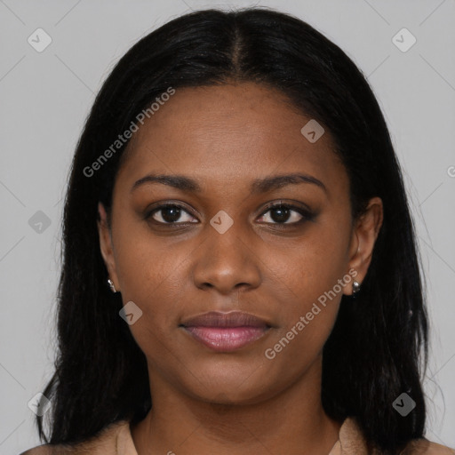 Joyful black young-adult female with long  black hair and brown eyes