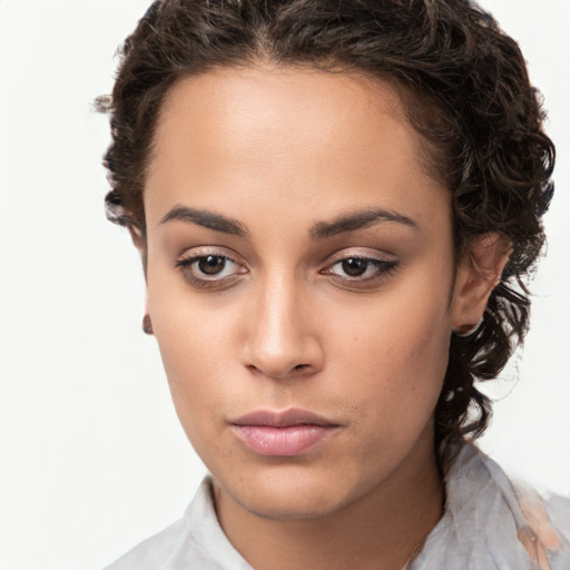 Neutral white young-adult female with short  brown hair and brown eyes