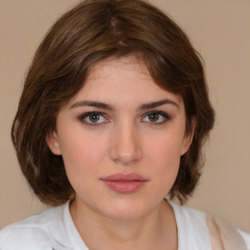 Neutral white young-adult female with medium  brown hair and brown eyes