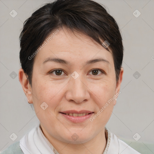 Joyful white adult female with short  brown hair and brown eyes