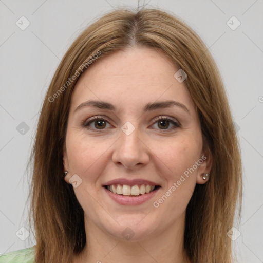 Joyful white young-adult female with long  brown hair and brown eyes