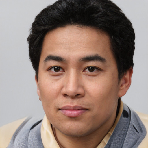 Neutral asian young-adult male with short  black hair and brown eyes