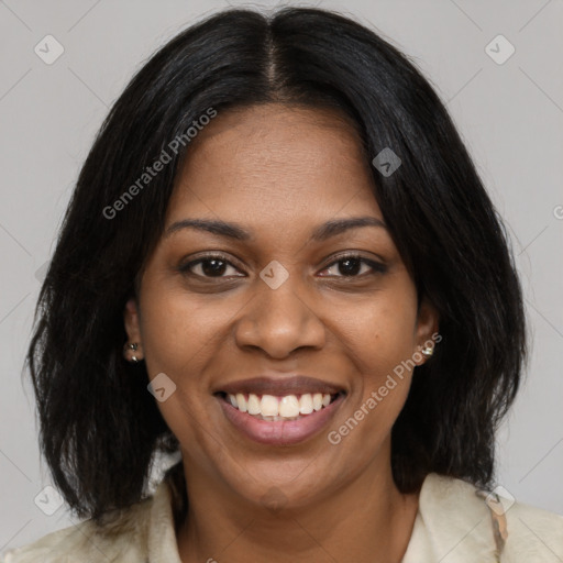 Joyful black young-adult female with medium  black hair and brown eyes