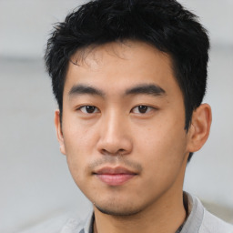 Neutral asian young-adult male with short  black hair and brown eyes