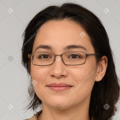 Joyful white adult female with medium  brown hair and brown eyes