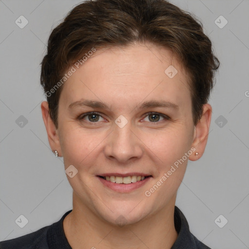 Joyful white young-adult female with short  brown hair and grey eyes